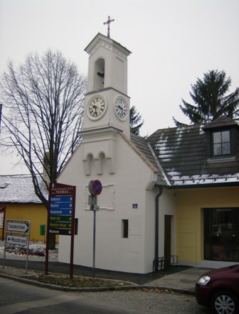 Glockenturm in Haus integriert